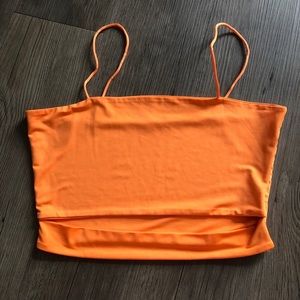 Orange crop top with cutout